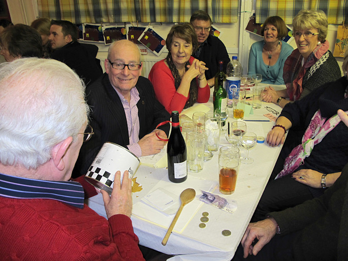 Wooden-spoon winners with catering size baked beans bonus